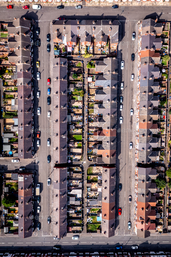 Aerial view directly above the rooftops of back to back terraced houses in the North of England