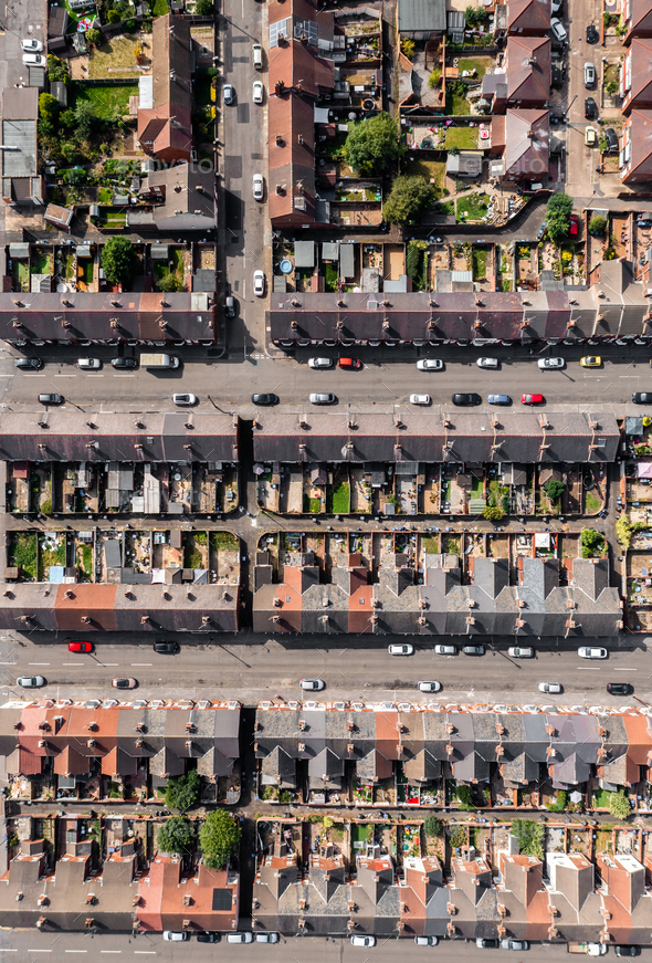 Aerial view directly above the rooftops of back to back terraced houses in the North of England