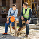 Two men engineers at a construction site are talking - PhotoDune Item for Sale