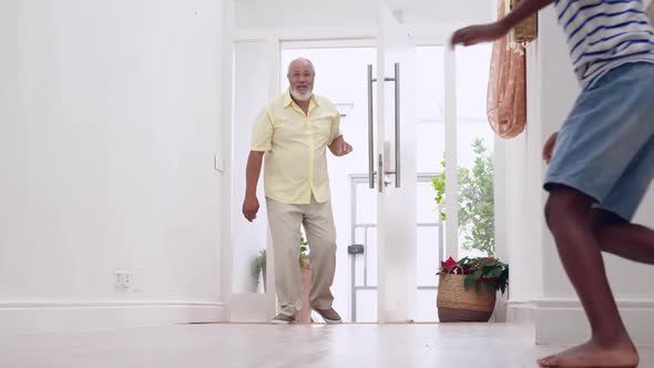 Mature man and his grandson alt