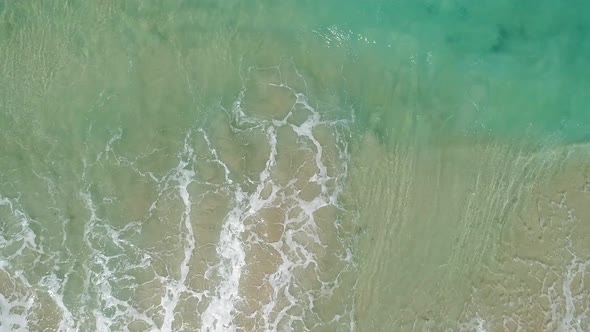 Ocean with Waves and Yellow Beach alt