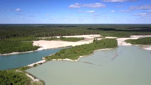 Big Lake with Sand Mining Sites in Water at Spit Upper View alt