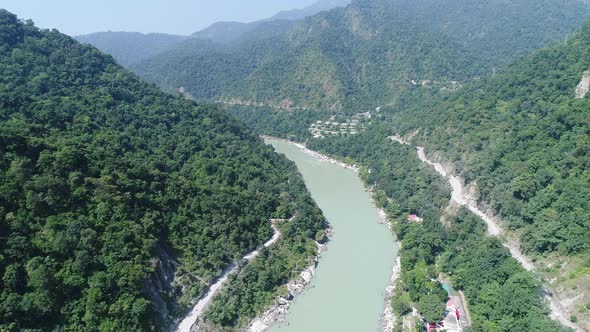The Ganges river close to Rishikesh state of Uttarakhand in India from the sky alt