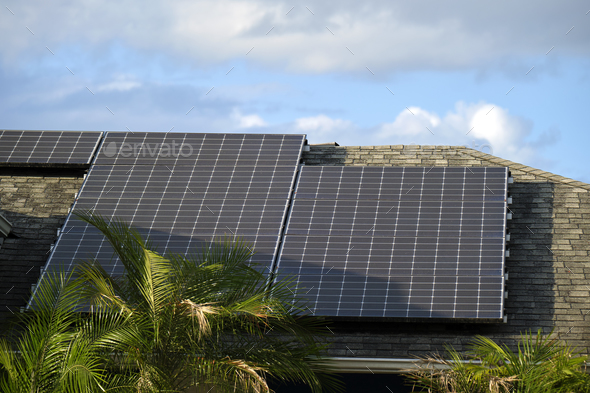 Private home roof covered with solar photovoltaic panels