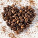 Heart shape from brown roasted coffee beans Robusta, Arabica coffee on ground coffee on a white - PhotoDune Item for Sale