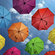 Bright multi-colored umbrellas in the form of decoration against the blue sky - PhotoDune Item for Sale