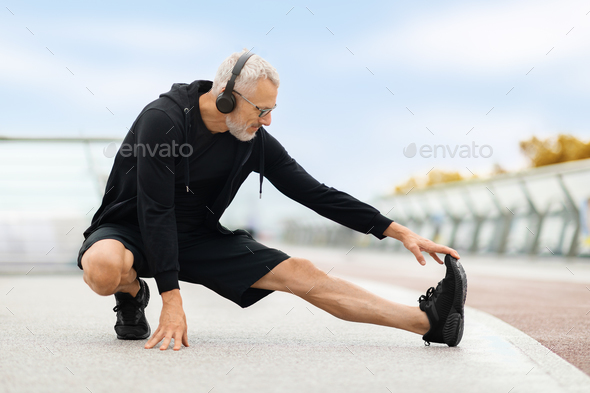 Senior fitness, exercise and black man stretching outdoor at park
