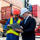Foreman or worker work at Container cargo site check up goods in container.  - PhotoDune Item for Sale