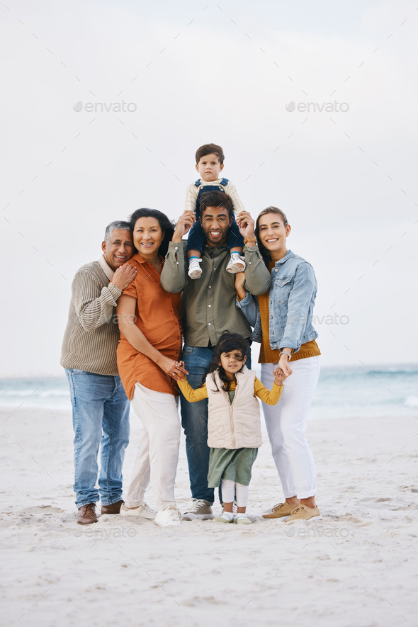 Big family, portrait and happy vacation on beach with children, parents ...