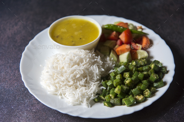 Healthy Indian veg meal rice, dal, vegetables and salad