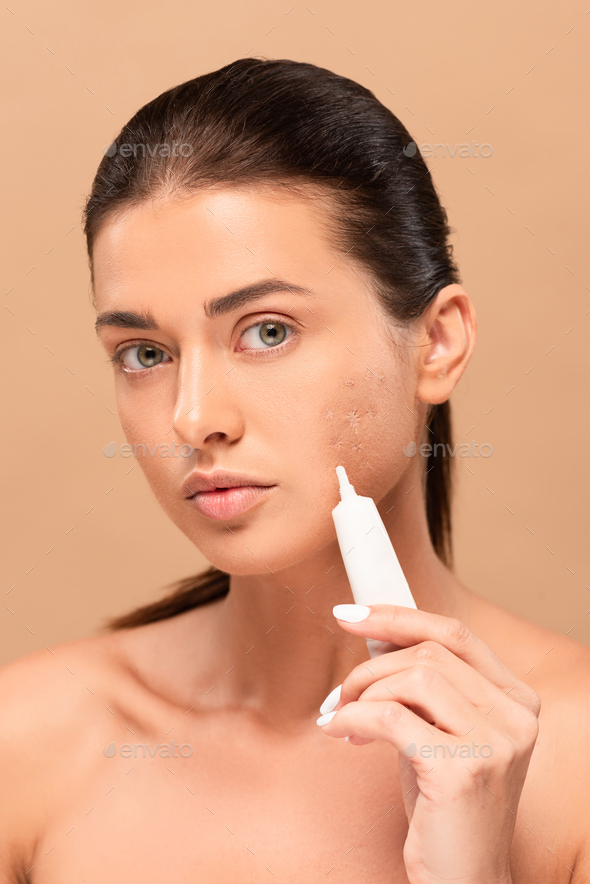 Nude Woman Covered in Whipped Cream and Sprinkles Stock Photo