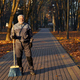 Mature male worker posing with broom in park.  - PhotoDune Item for Sale