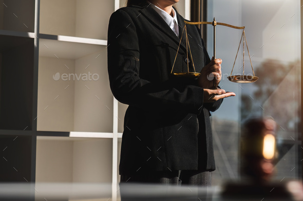 Concept of justice and law, female lawyer in office with brass degree.