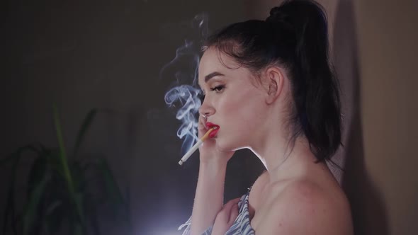 Model With Cigarette In the Studio