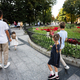 Back view of family with four kids walking in Lviv city, Ukraine. - PhotoDune Item for Sale
