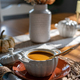 Hot pumpkin soup on a dining room table - PhotoDune Item for Sale
