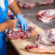 Butcher cutting fresh meat - PhotoDune Item for Sale