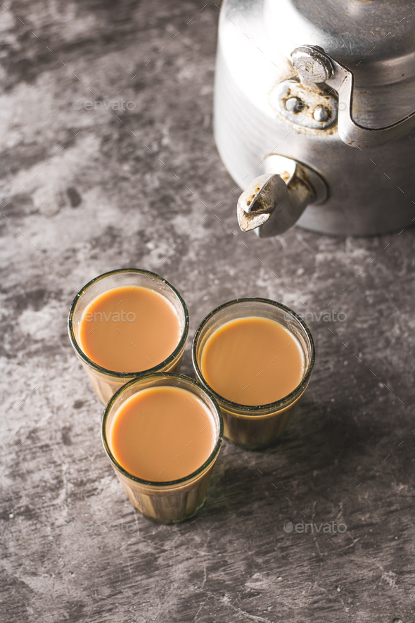 Indian chai in glass cups with masalas to make the tea. Stock