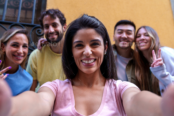 Vibrant Multiracial Squad Capturing Urban Joy in City Selfie