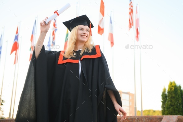 Female College Graduate in Cap and Gown Stock Photo - Image of