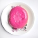 Pink glazed donut on plate - PhotoDune Item for Sale