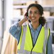 Young Woman Working In Warehouse Wearing Headset And Hi Vis Safety Vest - PhotoDune Item for Sale