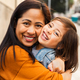 Happy southeast Asian mother with her daughter having fun in the city center - Lovely family outdoor - PhotoDune Item for Sale