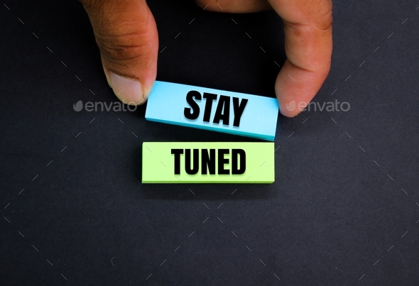 colored paper with the word stay tuned.