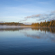 Shoreline in morning fog and light on a beautiful blue northern Minnesota lake in September - PhotoDune Item for Sale