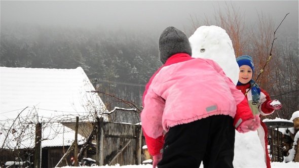 Kids Playing With Snow 01