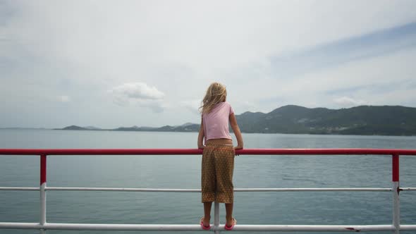Lonely Girl Child on a Ferry in Asia