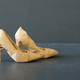 A brand new high heels shoes wrapped in rustic beige craft paper. Black Friday shopping concept - PhotoDune Item for Sale