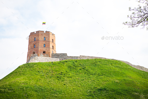 View of the castle on a green hill. Vilnius is the capital of Lithuania - Stock Photo - Images