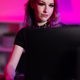 Dedicated female e-sports gamer who streams and plays online video games on her PC - PhotoDune Item for Sale