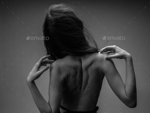 black and white photography portrait of woman with naked back cropped view  and close-up Stock Photo by shotprime