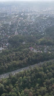 Aerial View of the Border of the Metropolis and the Forest alt