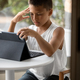 Preteen child using laptop on the table while doing his homework online, studying at home - PhotoDune Item for Sale