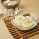 close up of minced garlic on a wooden spoon  - PhotoDune Item for Sale