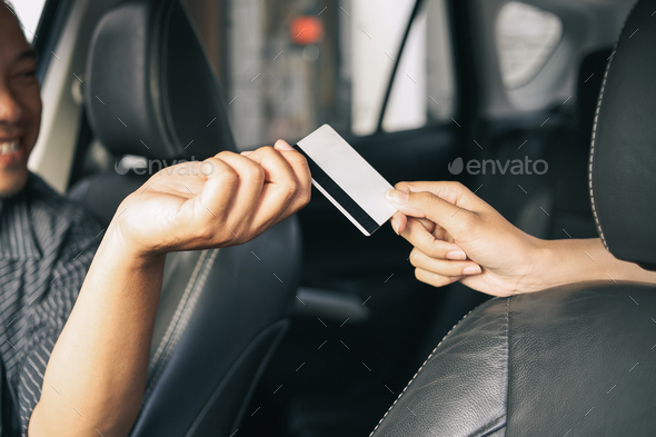 Taxi Passenger Paying with Credit Card