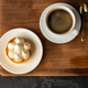 Meringue tart with coffee cup on dark gray background - PhotoDune Item for Sale