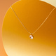 Big diamond solitaire necklace with chain on yellow background - PhotoDune Item for Sale