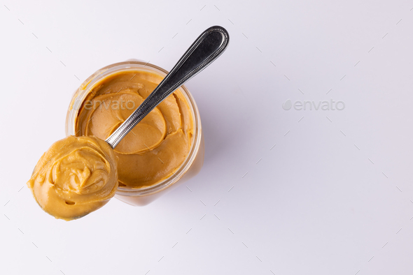 spoon of peanut butter Stock Photo