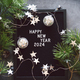 Happy New Years 2024. Christmas background with cone tree and Christmas decorations. - PhotoDune Item for Sale