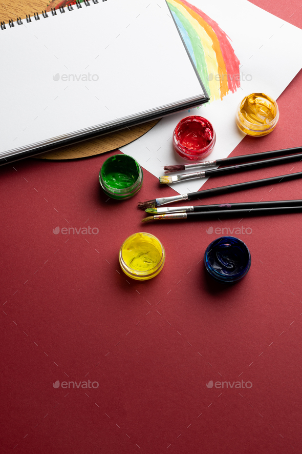 Paint and brushes . Back to school concept., Stock image