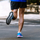 close-up sole of running shoe male runner, summer marathon race - PhotoDune Item for Sale
