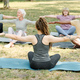People meditating outdoors in the park - PhotoDune Item for Sale