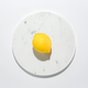 Fresh lemon on marble circle background - PhotoDune Item for Sale
