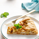 Apple pie slice with cinnamon and lemon zest on a plate - PhotoDune Item for Sale