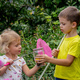 children catch butterflies butterflies in a jar. Selective focus - PhotoDune Item for Sale