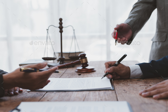 Lawyer discuss the contract document. Treaty of the law. Sign a contract business.